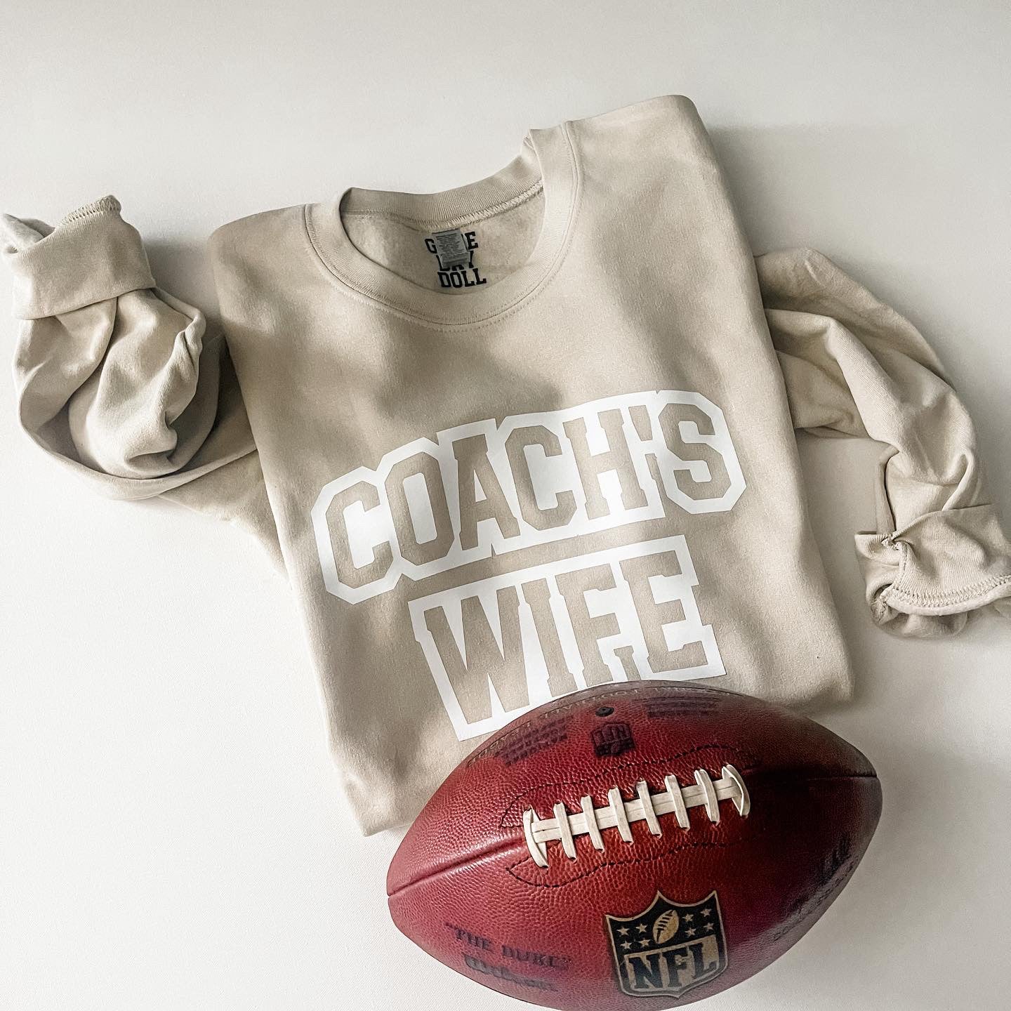 Coach’s Wife tan sweatshirt