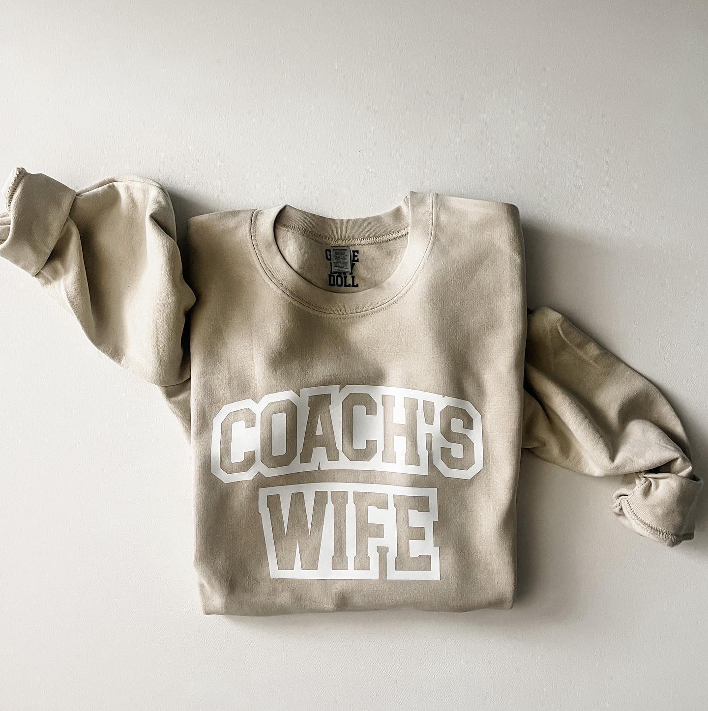 Coach’s Wife tan sweatshirt